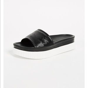 KENDALL AND KYLIE BLACK CAMO PLATFORM SANDAL 7.5